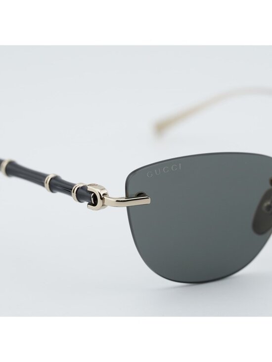 Gucci GG2063S 002 Sunglasses Shiny Endura Gold Cat Eye Frame, Grey Lenses main image 5